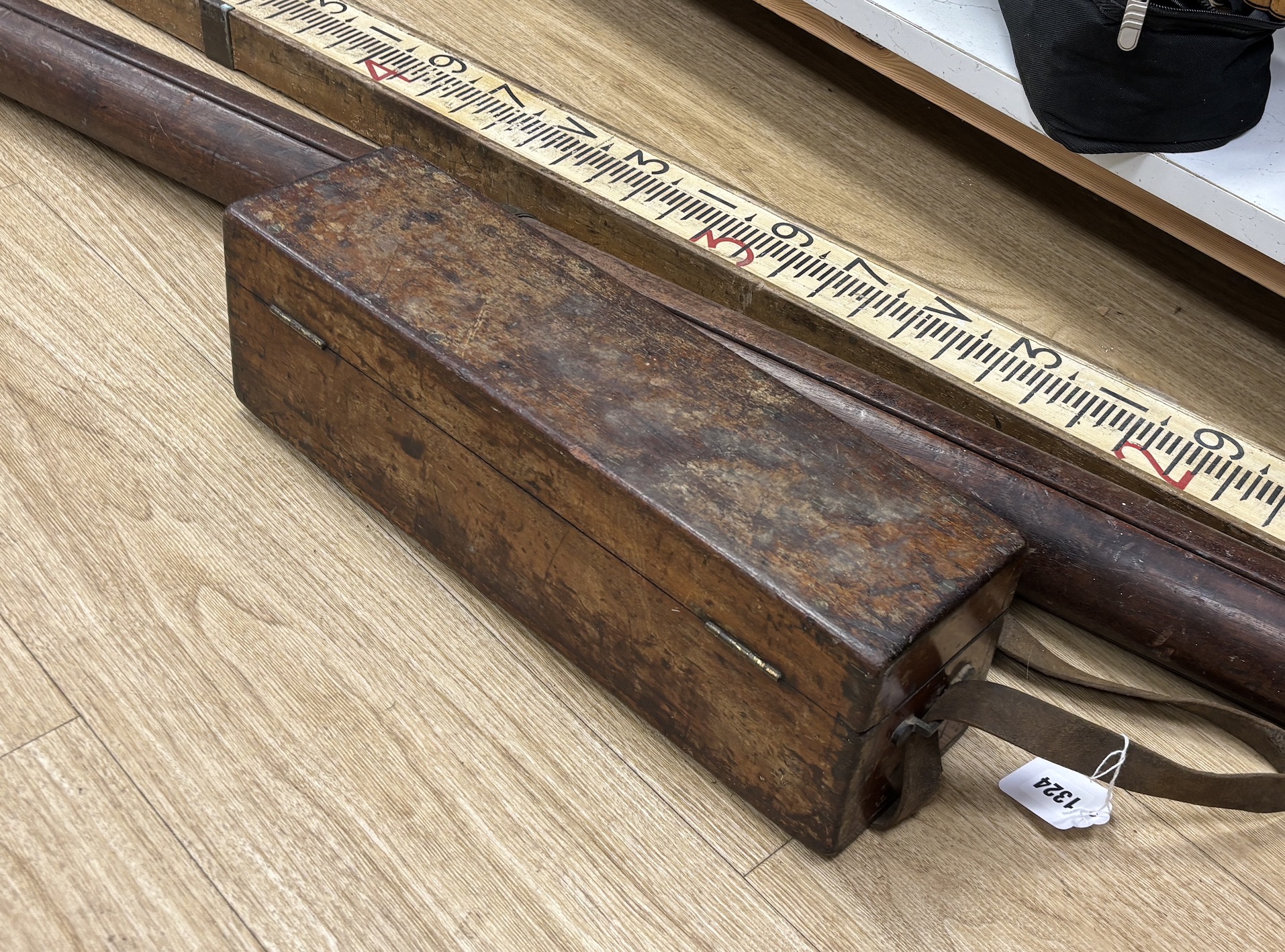 An early 20th century mahogany cased Stanley theodolite, with stand and surveyor's stick